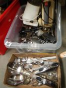 A box full of clean cutlery etc.