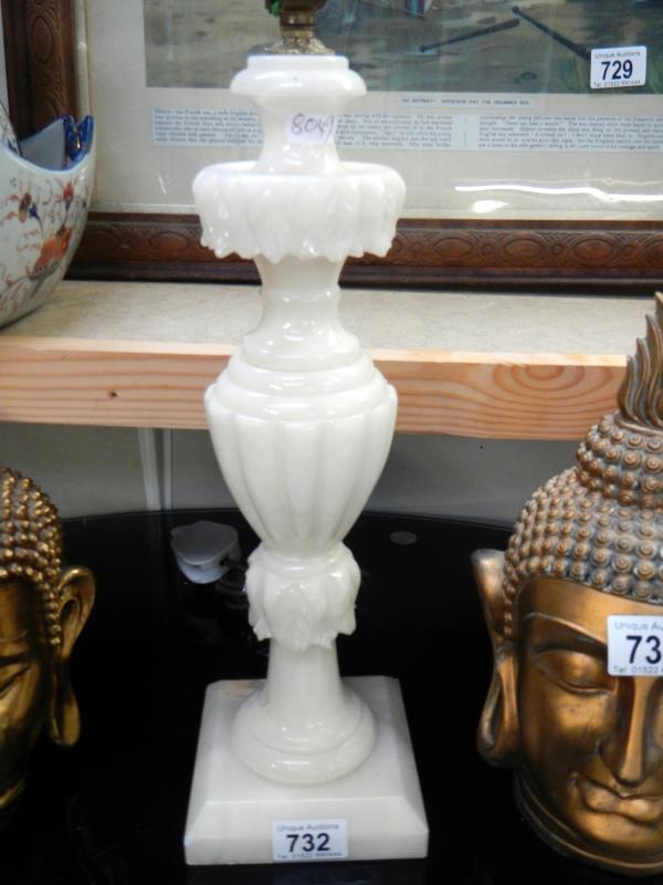 A heavy tall alabaster table lamp