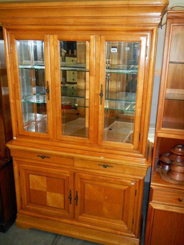 A light mahogany glazed bookcase