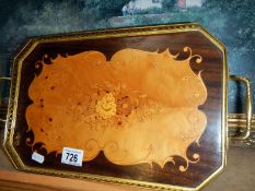 An inlaid tray with brass coloured gallery