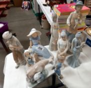 A quantity of Lladro style figures