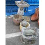 A bird bath & plant pots