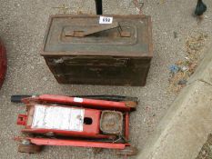 A trolley jack & tools in an ammo box