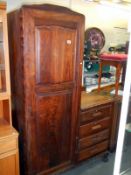 A combination wardrobe chest of drawers