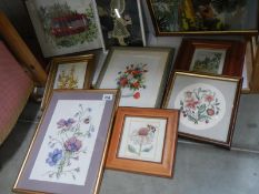 A selection of embroidered pictures etc