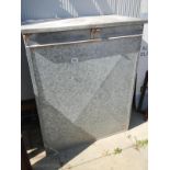 A galvanised storage bin