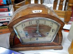A mid 20th century mantle clock in working order
