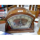 A mid 20th century mantle clock in working order