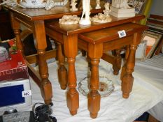 A clean oak nest of tables