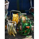 4 reels of hose pipes & seeders