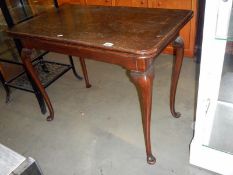 A 20th century fold over card table