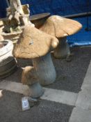3 concrete mushrooms