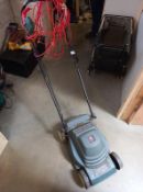 A Black & Decker Rotamow rotary electric lawn mower (no storage hopper)