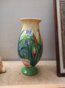 A country artists inspirational Moorcroft style vase