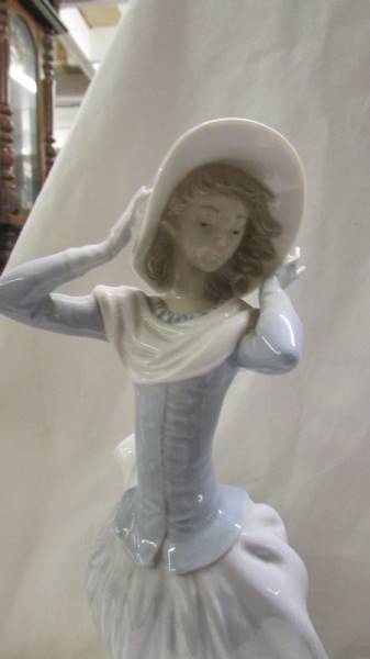 A 1920's style Lladro flapper lady and another Lladro lady. - Image 6 of 7