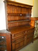 A mid 20th century oak open rack dresser, COLLECT ONLY.