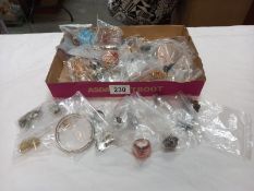 A mixed lot of costume earrings, rings etc
