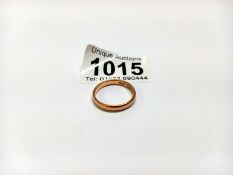 An 18ct gold wedding ring, size N, 3.1 grams.
