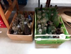 A good collection of vintage and antique bottles