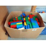 A quantity of Lego Duplo building blocks and motorised train plus track figures, animals and bushes