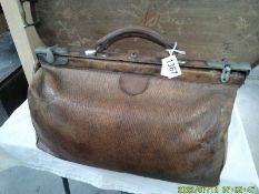 An old Gladstone bag, in fair condition.