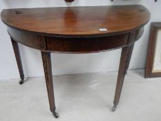 A Victorian mahogany D end hall table. COLLECT ONLY.