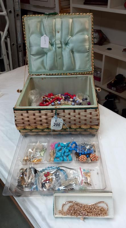 A vintage jewellery box and costume jewellery