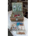 A vintage jewellery box and costume jewellery