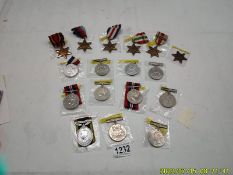 Eleven WW2 medals and six WW2 stars including Defence, Territorital Efficency, Service etc.,