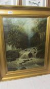 An oil on canvas waterfall scene. COLLECT ONLY.