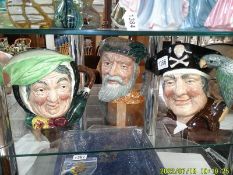 Three Royal Doulton character jugs, Sarey Gamp, Robinson Crusoe and Long John Silver.