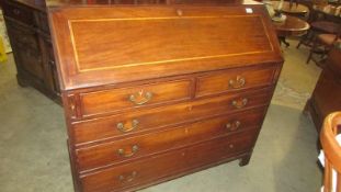 A large good quality mahogany inlaid bureau. COLLECT ONLY.