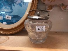 A Victorian cut glass biscuit barrel with silver plated fittings