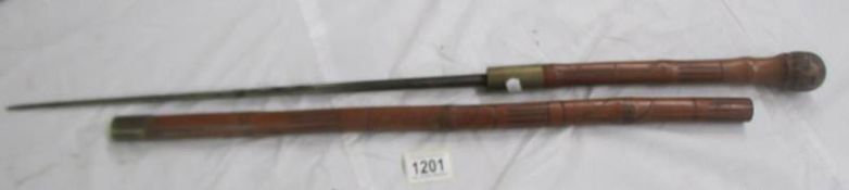 An old swordstick, lenght 86 cm, blade 48.5 cm.