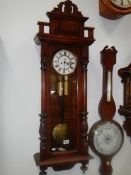 A Victorian twin weight Vienna wall clock. COLLECT ONLY.