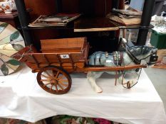 A vintage pottery horse and cart