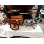 A vintage pottery horse and cart