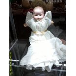 A small Armand Marsielle busque headed dream baby doll, marked A M Germany, no numbers.