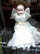 A small Armand Marsielle busque headed dream baby doll, marked A M Germany, no numbers.