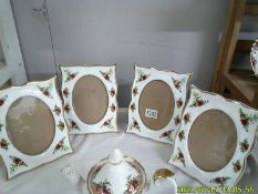 Four Royal Albert Old Country Roses photo frames.