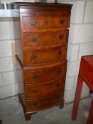 A mahogany bow front chest on chest. COLLECT ONLY.