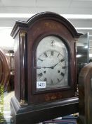 An Edwardian inlaid mantel clock, in working order.