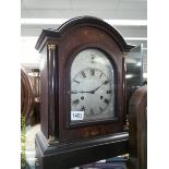An Edwardian inlaid mantel clock, in working order.