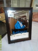 A vintage 'Antiquax' advertising mirror, 20.5 x 27.5 cm.