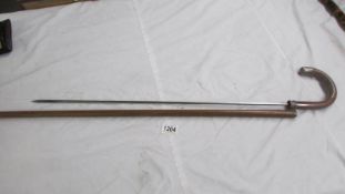 An old sword stick, 90 cm, blade 68 cm.