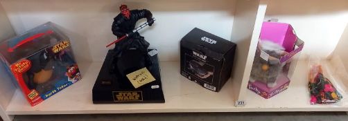 A Star Wars Darth Maul money box, Furby and other toys