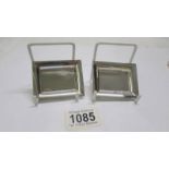 Two silver Tiffany card trays, 7 x 5.5 cm. 57 grams.