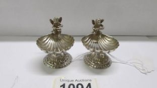 A pair of silver salts surmounted cherubs, Birmingham 1894/95.