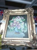 A gilt framed oil on canvas floral arrangement, signed Mavis Somerset?.