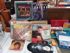 A collection of records including Elvis